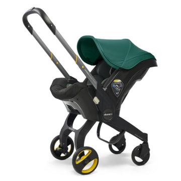 Doona - Coche con asiento de auto verde
